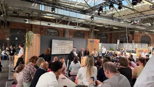 re/publica event with people listening to speakers