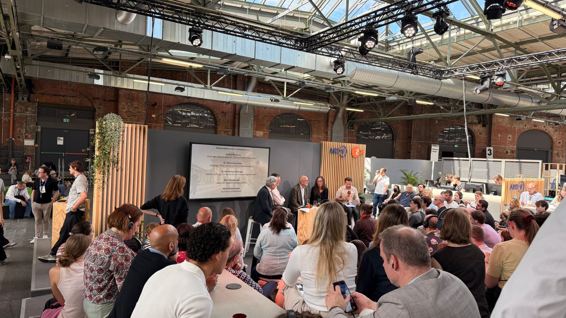 re/publica event with people listening to speakers