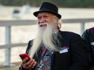 man with beard listening