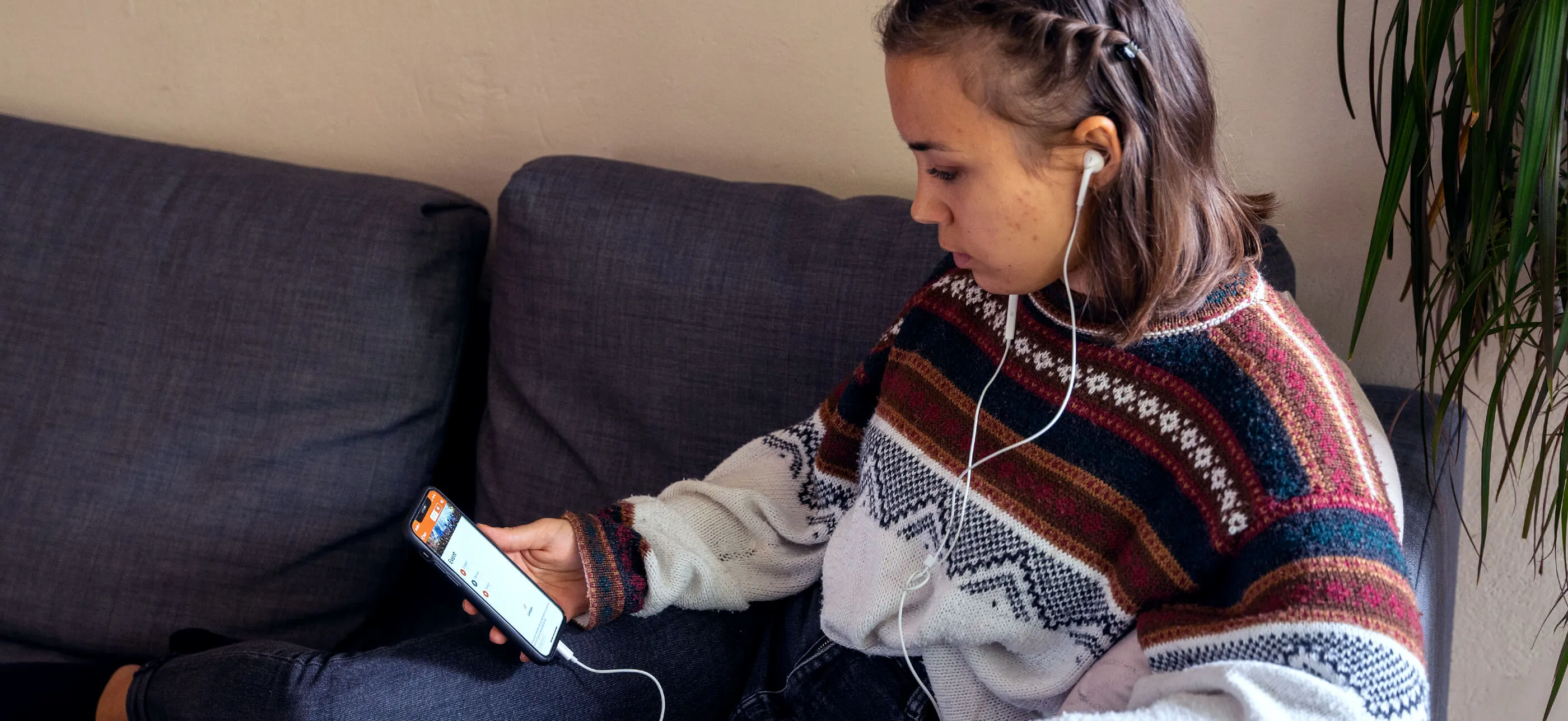 person listening at event via livevoice app