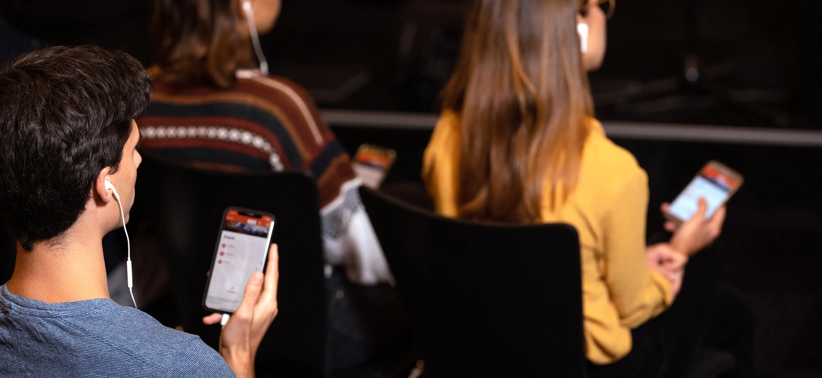 person listening at church via livevoice app